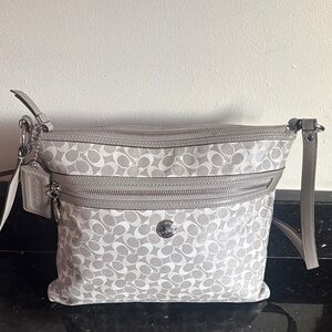 Coach Gray Leather Crossbody Bag with Signature Monogram.